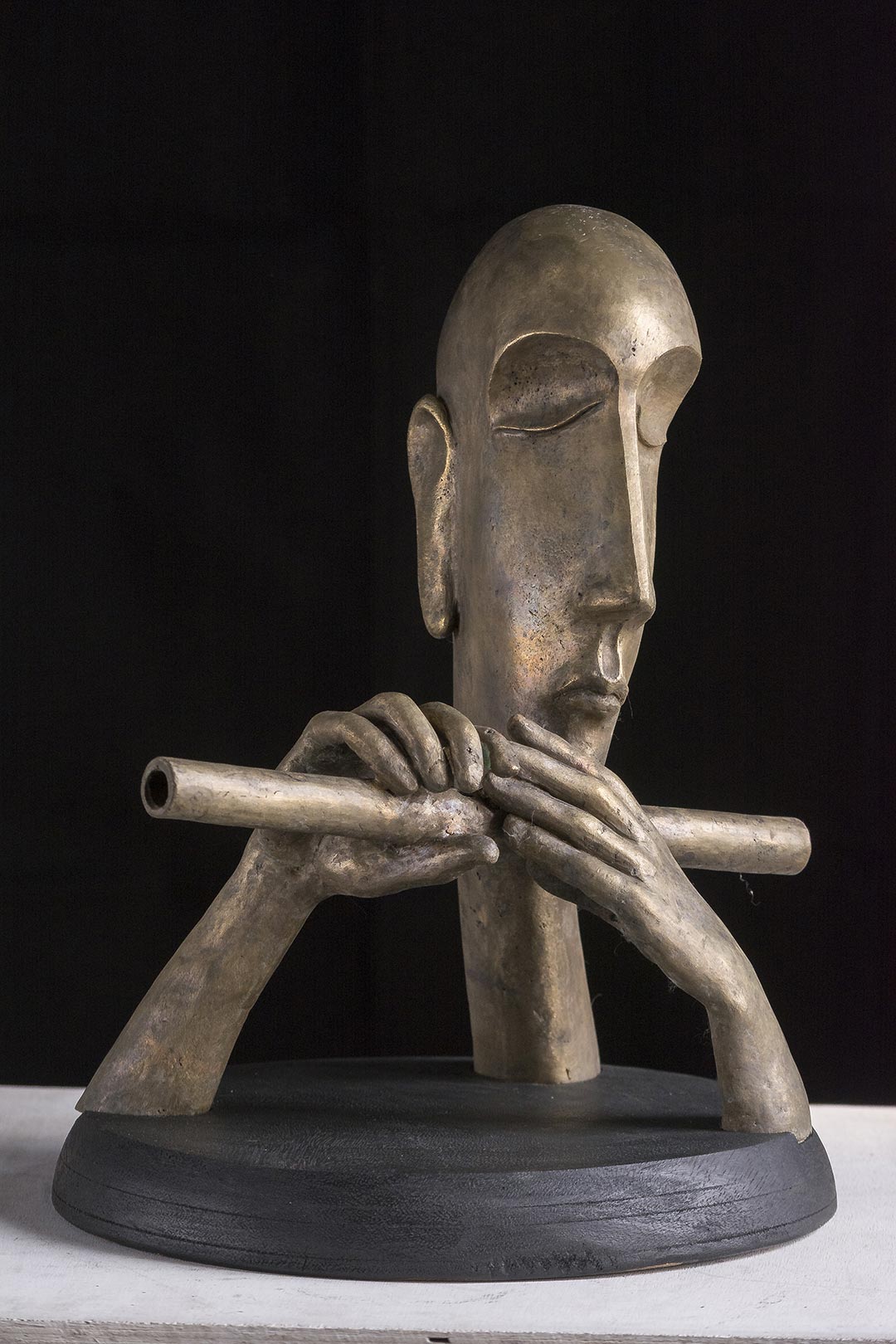 Figurative Sculpture with Bronze"Tune" art by Prabir Roy